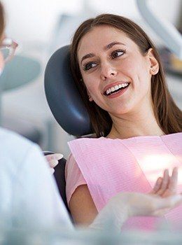 Smiling woman in dental chair