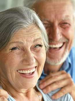 An older couple smiling together