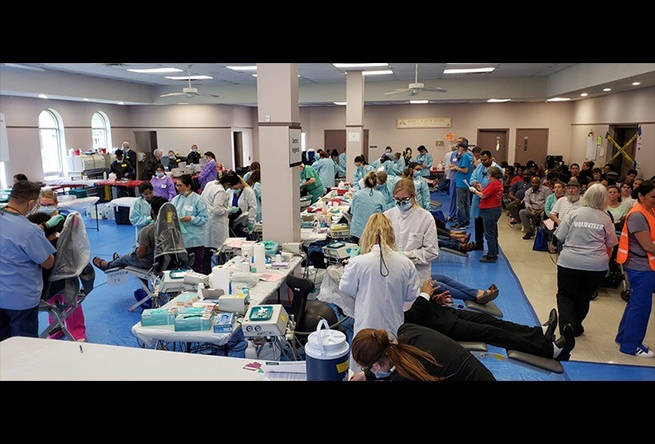 Group of dentists and dental team members offering dentistry services