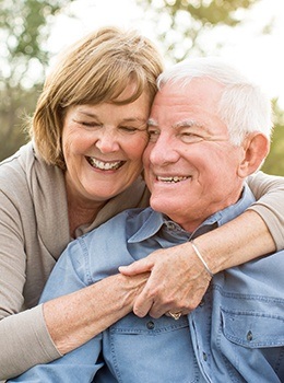 Older man and woman outdoors