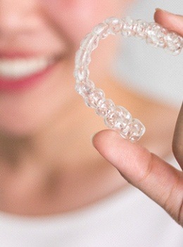 Holding Invisalign aligner