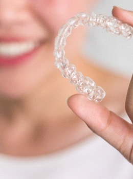 Holding Invisalign aligner