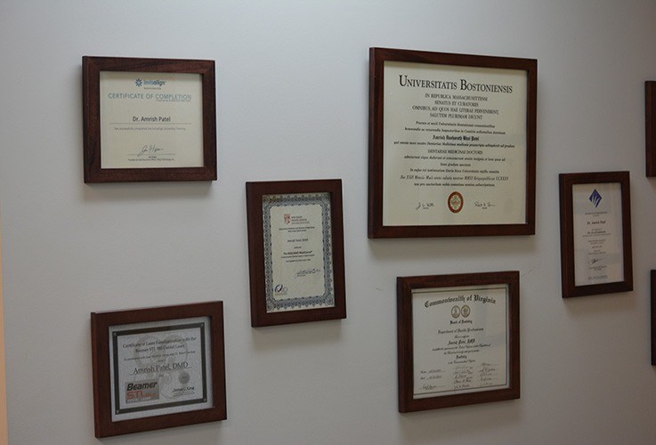 Diplomas and certificates on wall