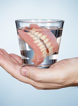 Dentures in a glass of water