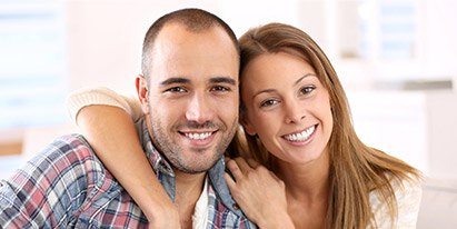 Smiling man and woman