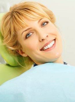 woman smiling in dental chair