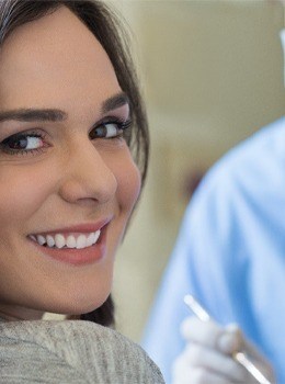 Smiling woman in dental chair